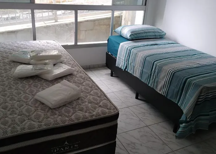 Apartamento com 4 quatros em frente a praia em Pitangueiras - Guarujá